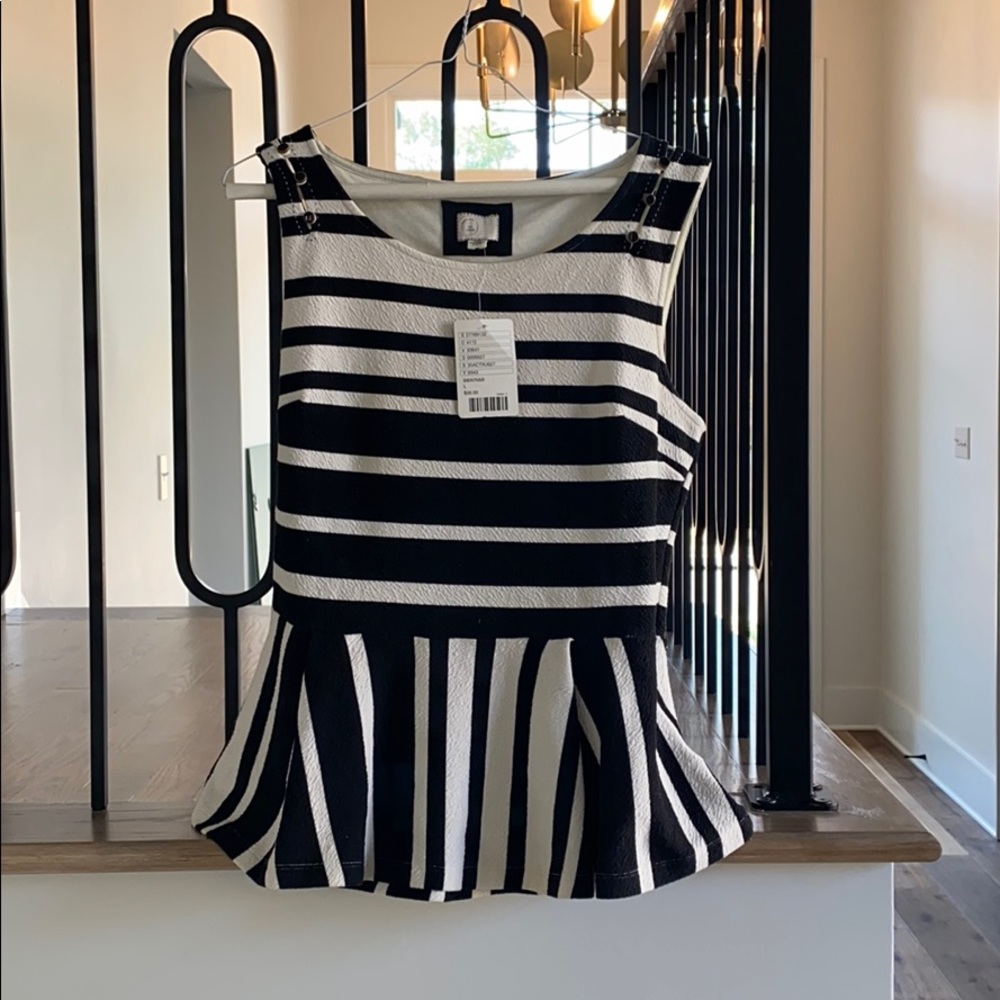 Anthropologie black and white peplum top